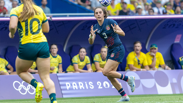 Kayla Canett catching a rugby ball against Team Australia at the 2024 Olympics