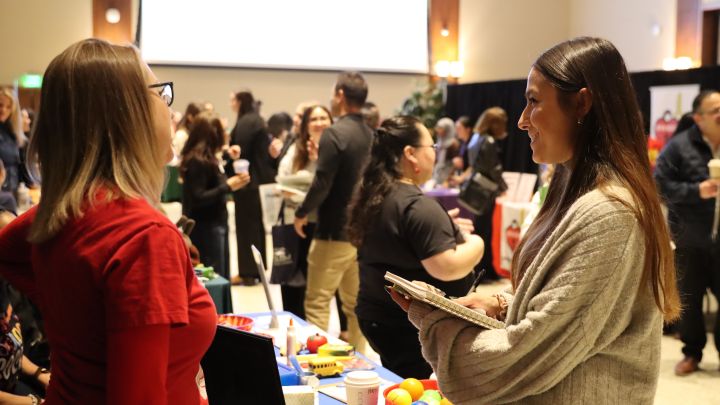 Social Worker Agency worker and student talking to each other