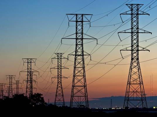 Powerline towers at sunset